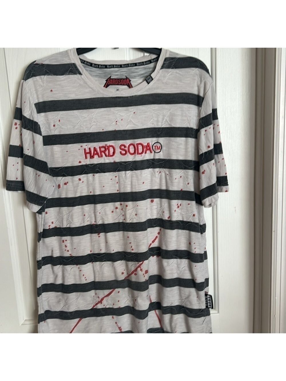 Hard soda t shirt. Gray black striped with Red splatter design.  Size XL